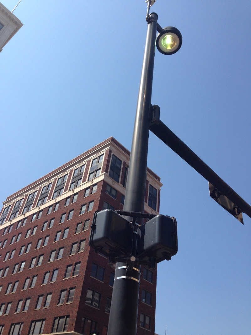 On a sunny day in downtown Wichita you can see the street lights